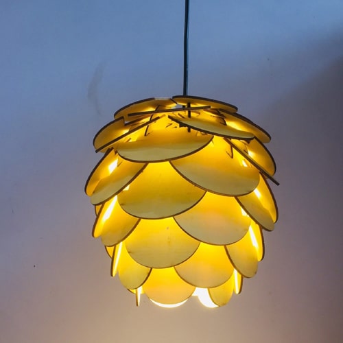 Wood lamp in the shape of a pine tree